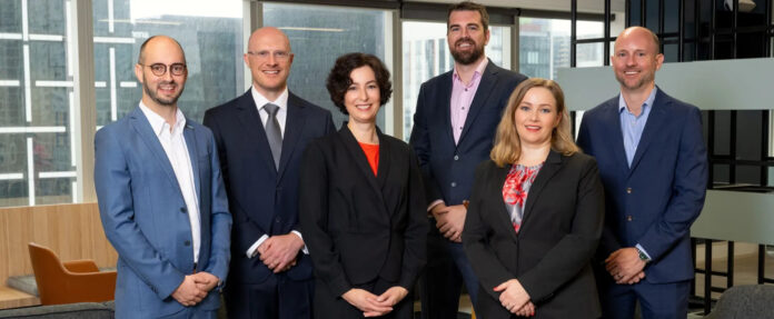 Left to right: Dr Matthew Rowe, Director Power Grids, Asia Pacific, Energy Systems at DNV; Tim Gorman, Director of Power System Analysis, Smarter Power Solutions; Dr Lena Landsmann, Vice President and Regional Director APAC, Energy Systems at DNV; Barry O’Connell, Managing Director, Smarter Power Solutions; Kristine Hauge, Regional Finance & Performance Director, Asia Pacific, Energy Systems at DNV; Lachlan Bateman, Head of Power Systems Planning, Asia Pacific, Energy Systems at DNV