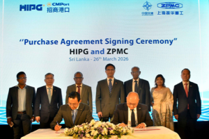 From Left to Right: Wilson Qu,CEO of HIPG,Michael Yang, Deputy Director of Sales & Marketing Management Department, ZPMC signing the agreement. Special Invitees witness the event