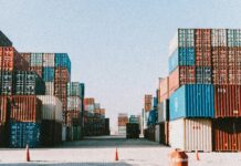 Swire Shipping revises emergency bunker surcharge across global trades containers in a port