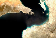 IMO launches evacuation plan for 11,000 stranded seafarers Strait of Hormuz satellite image in natural colors (RGB) – Per