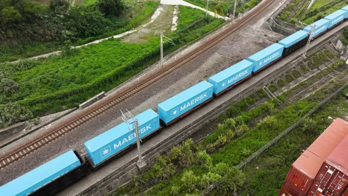 blue-maersk-containers-being-transported-by-rail