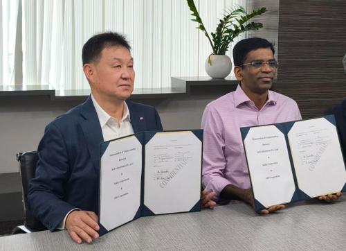 Mr. Srinivas Satya (Senior Vice President, TEPL) and Mr. Tanaka (President, NRS) after signing the MoU.