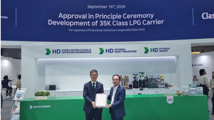 To the left of certificate: Mr. Hong-Ryeol Ryu, CTO, Head of Technology Division, HD Hyundai Heavy Industries To the right of certificate: Mr. Hayato Suga, President & CEO, ClassNK