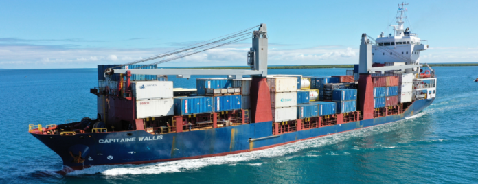 Capitaine Wallis: Capitaine Wallis carrying containers while sailing through calm blue waters.